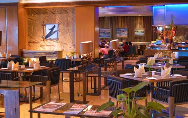 Hotel restaurant with marble feature wall