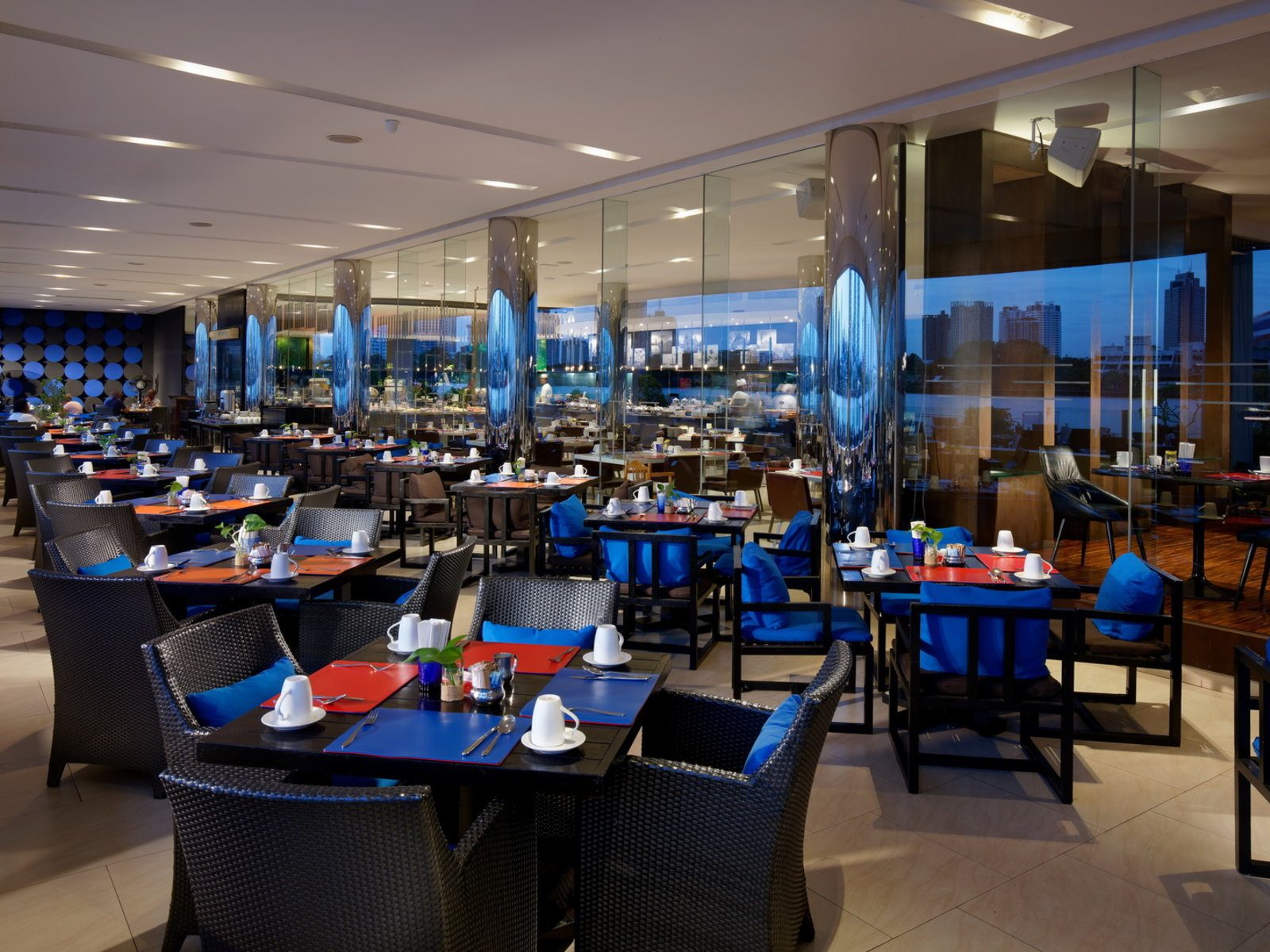 Hotel restaurant dining area with riverside view